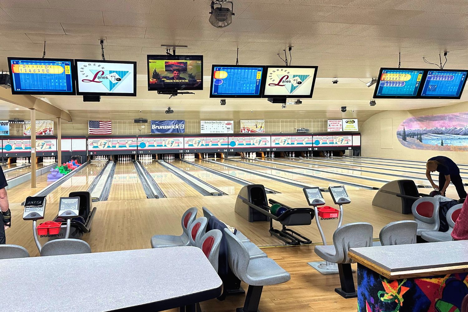 The inside of Evergreen Lanes in Everett. Bowling lanes in a bright room. 