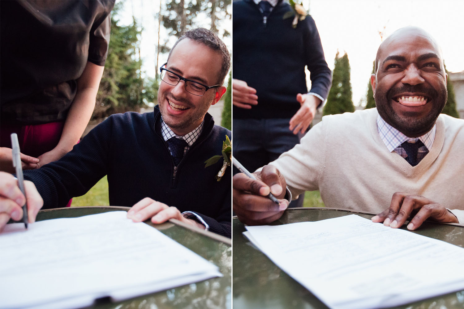 Phillip Jefferies (left) and Lance Lewis (right) smile as they sign their marriage certificate on their wedding day.