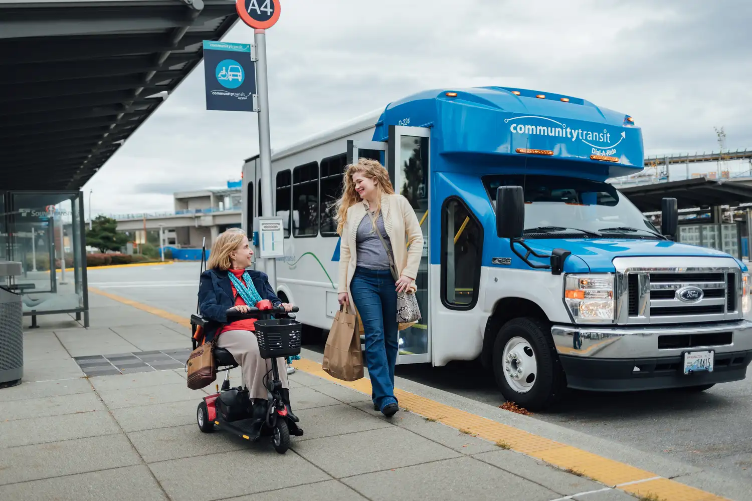 Dial-A-Ride Transit - DART bus and riders