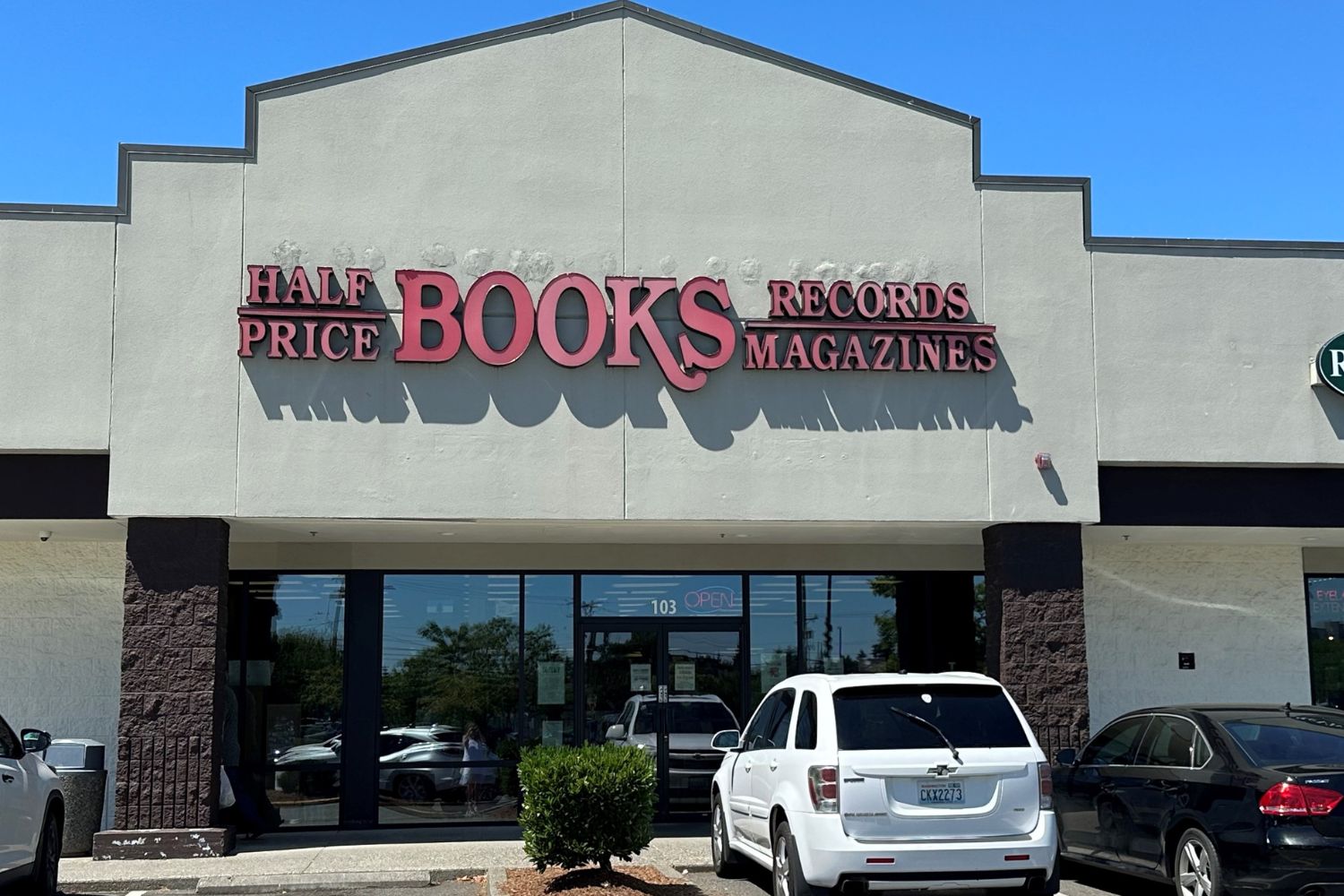 The outside of a Half Price books as seen from the parking lot. 