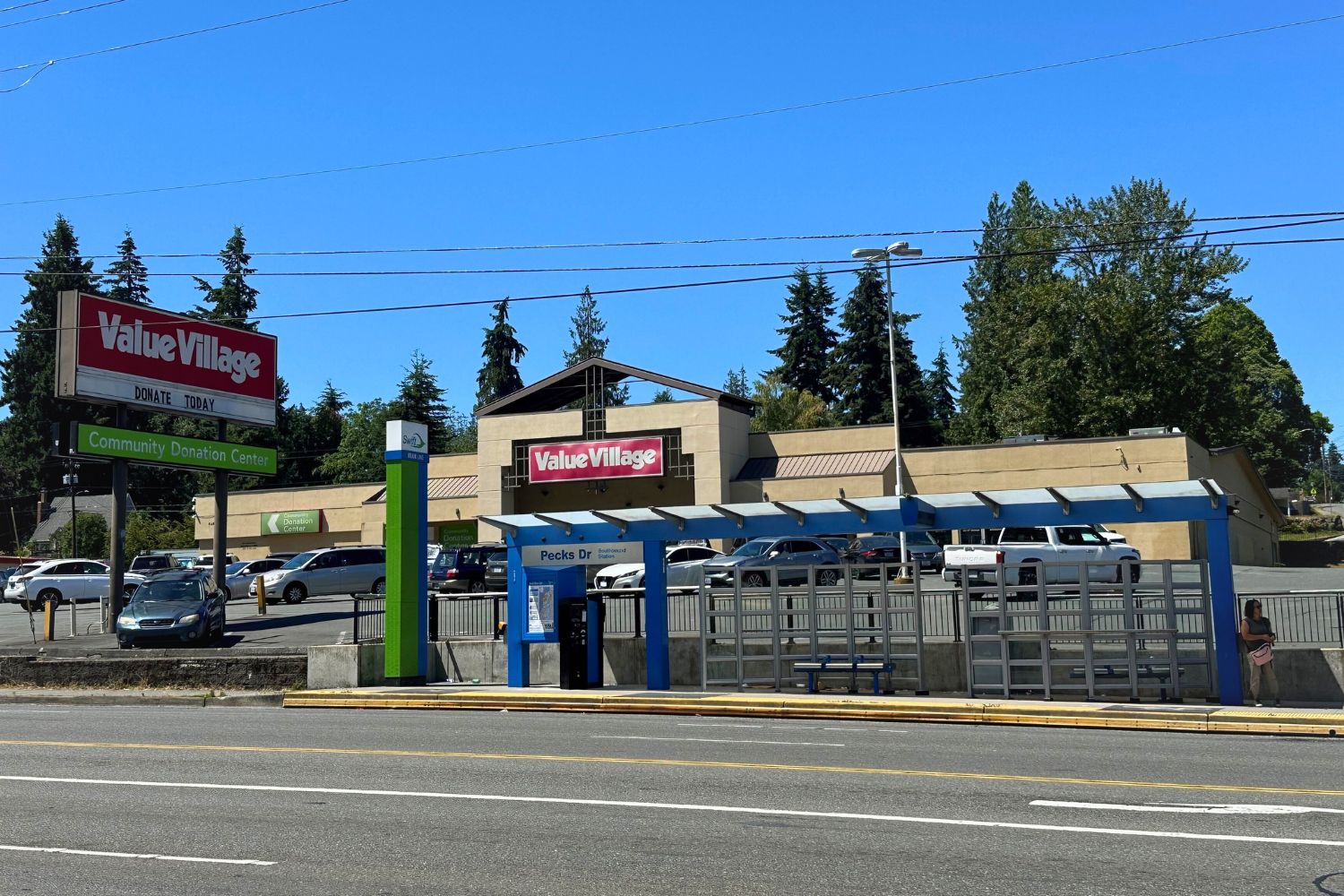 A Swift Station sits in front of a parking lot for a Value Village thrift store in Everett, WA.