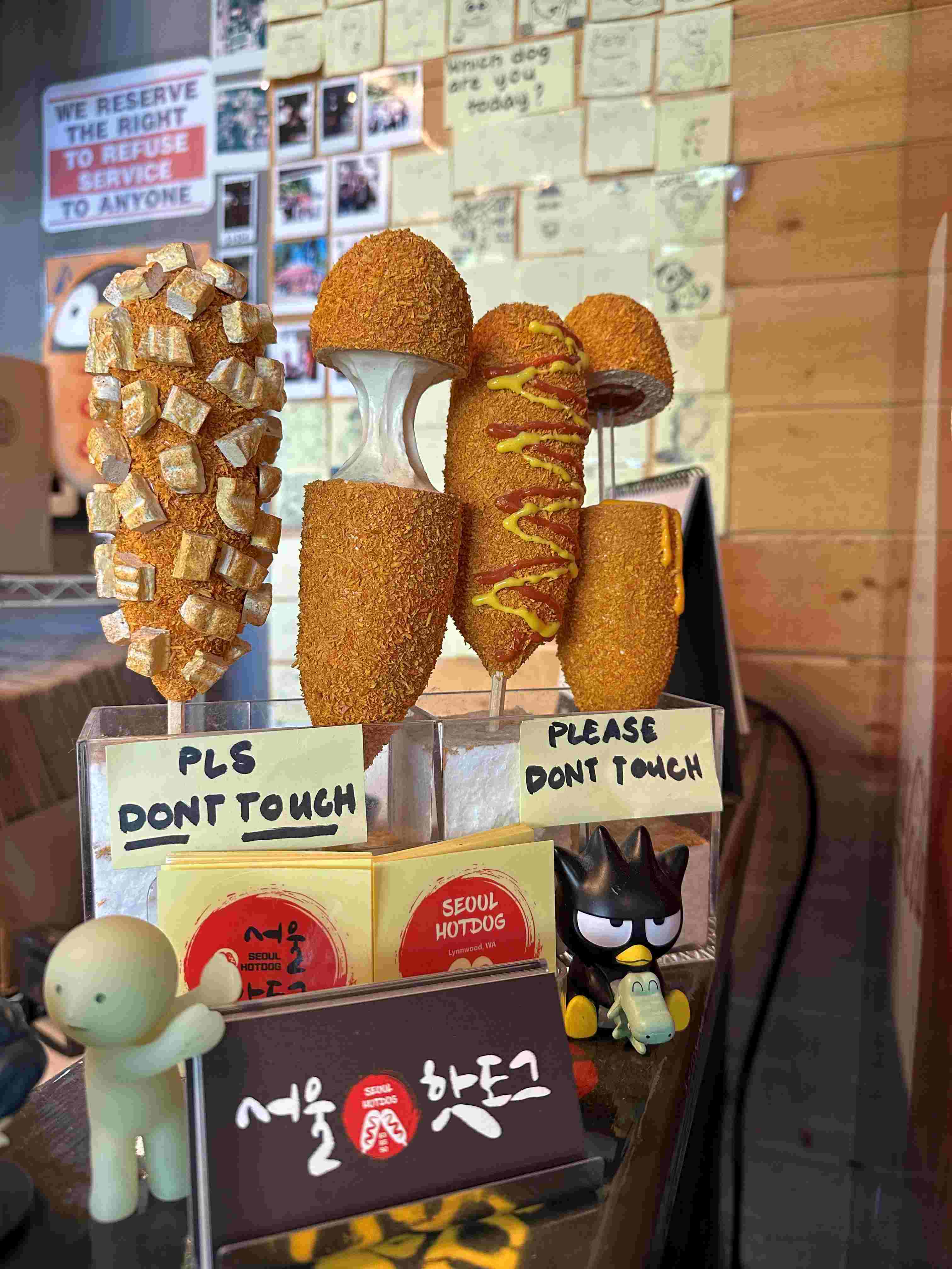 Display at Seoul HotDog showcasing different Korean hot dogs