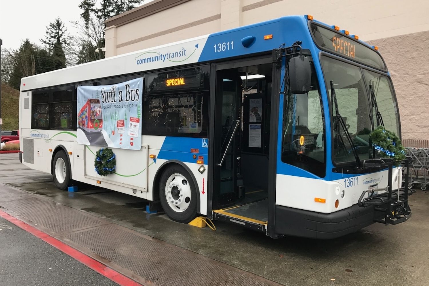 A 40-foot Community Transit bus is ready to be stuffed with toy and gift donations.