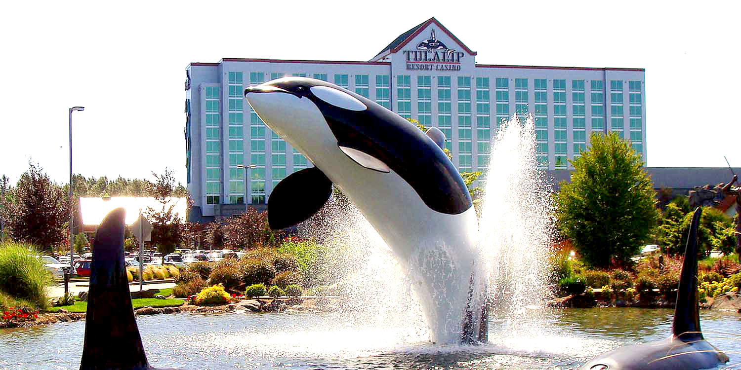 Tulalip Casino with its water fountain featuring sculptures of orcas