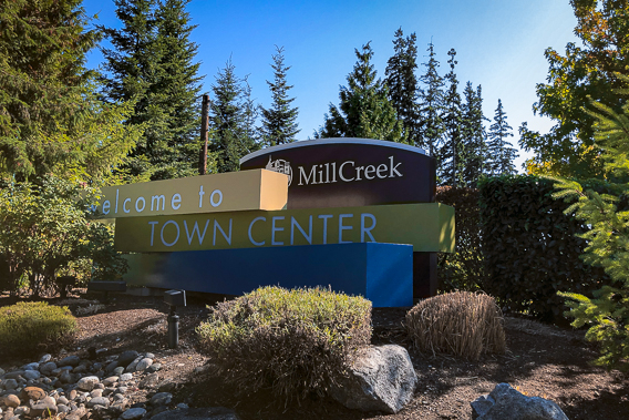 An image of the Welcome to Mill Creek Town Center sign