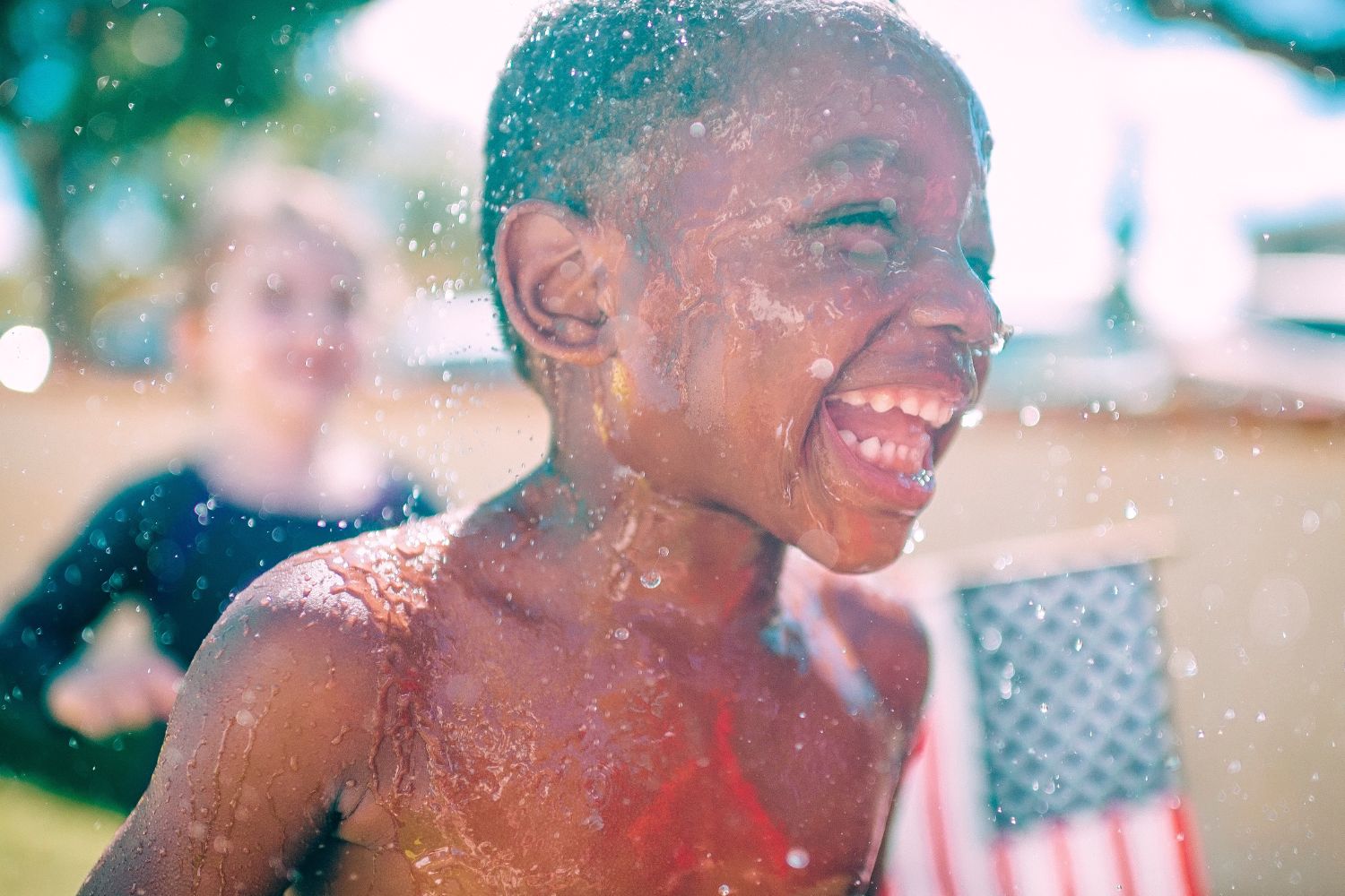 Happy kid at splash pad