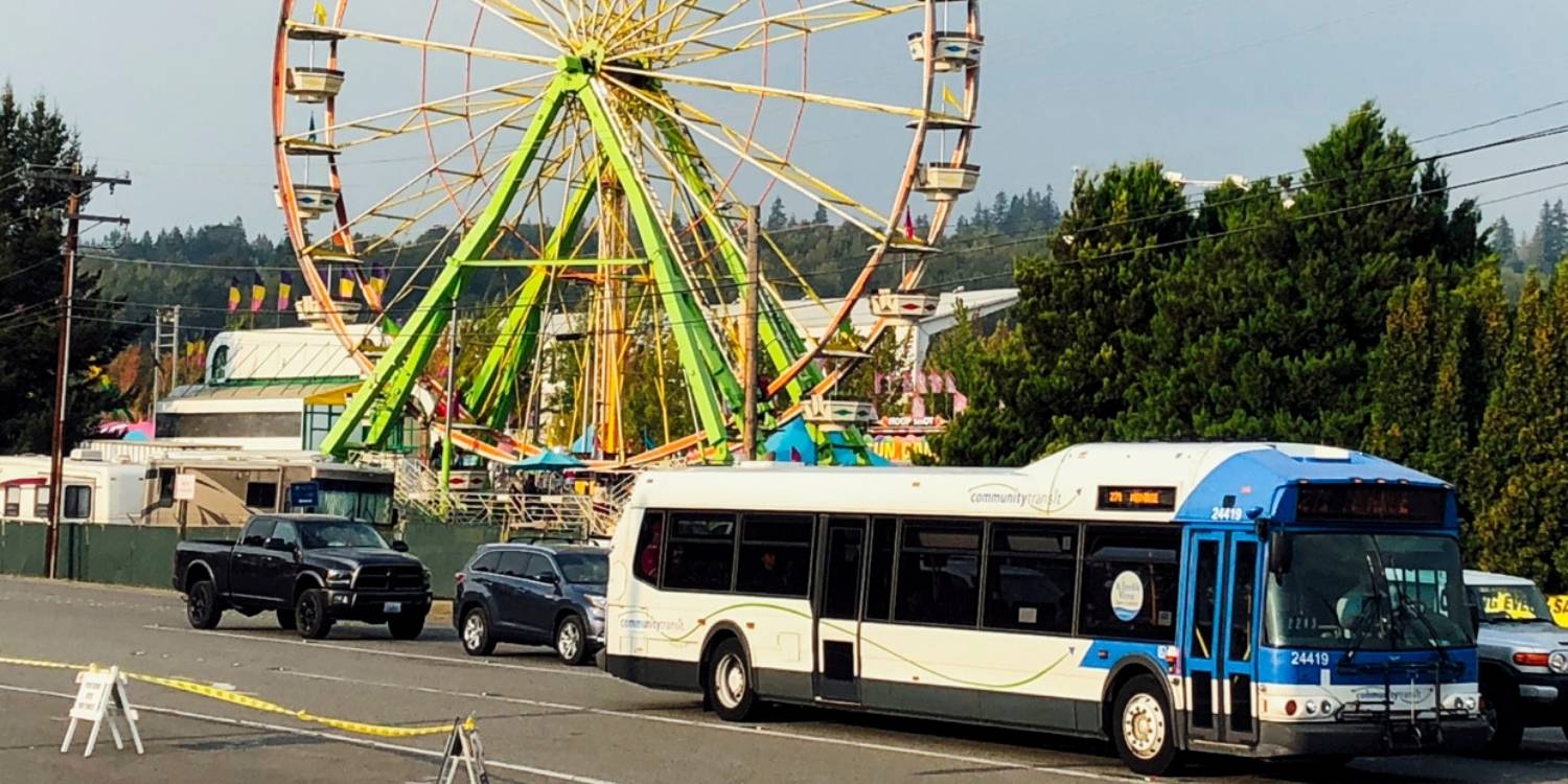 A Community Transit bus waits for passengers outside the Evergreen State Fair grounds.