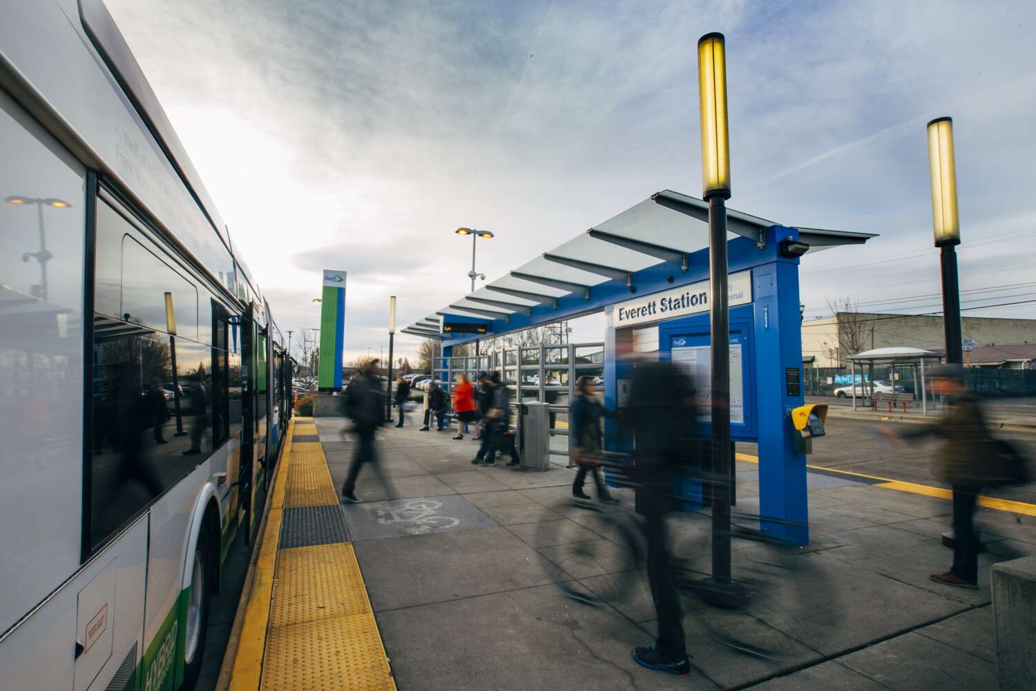 Riders get on and off the bus at Everett Station