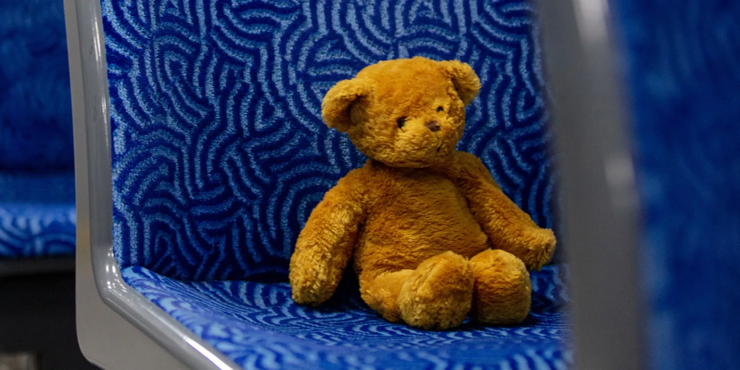 Lost & found a lost teddy bear sitting on a bus seat
