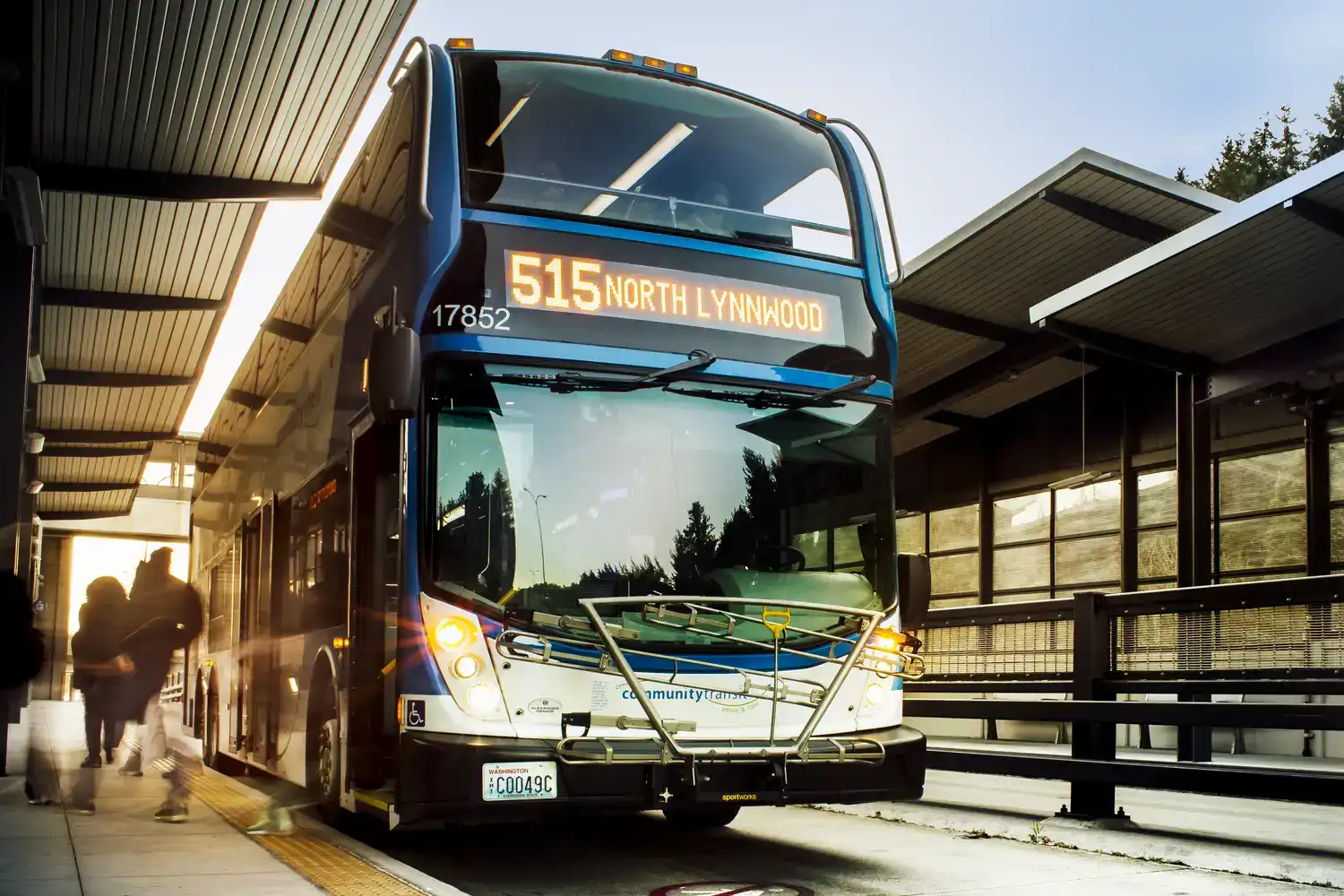 express routes a double-tall express bus stopped at a transit center