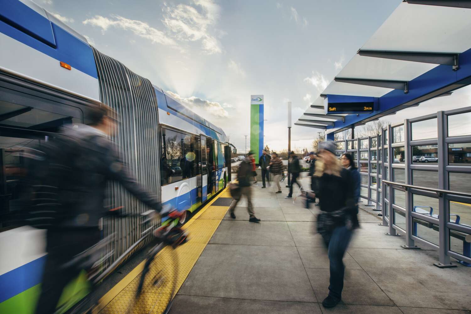 Riders at a Swift bus station