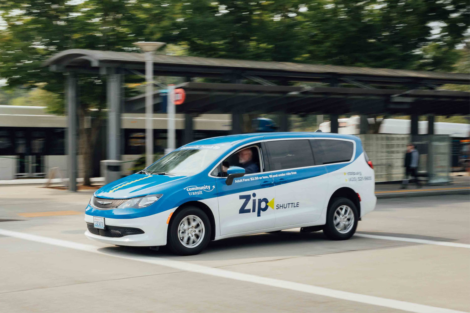 a Zip Shuttle ride share van driving